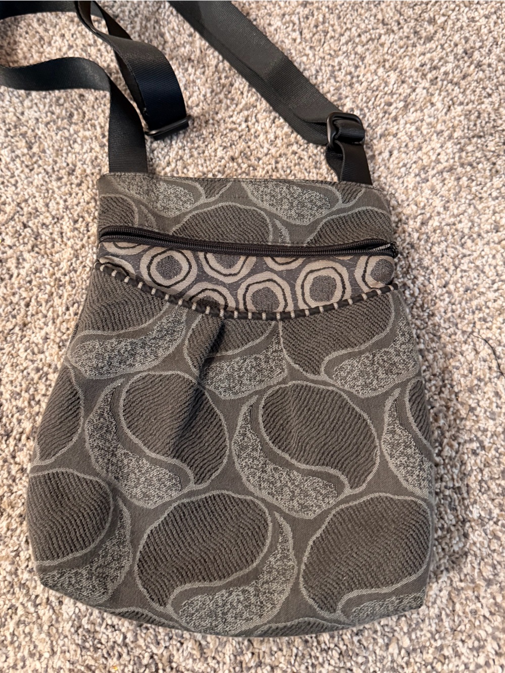 Textured Gray Crossbody Bag with Circular Motif